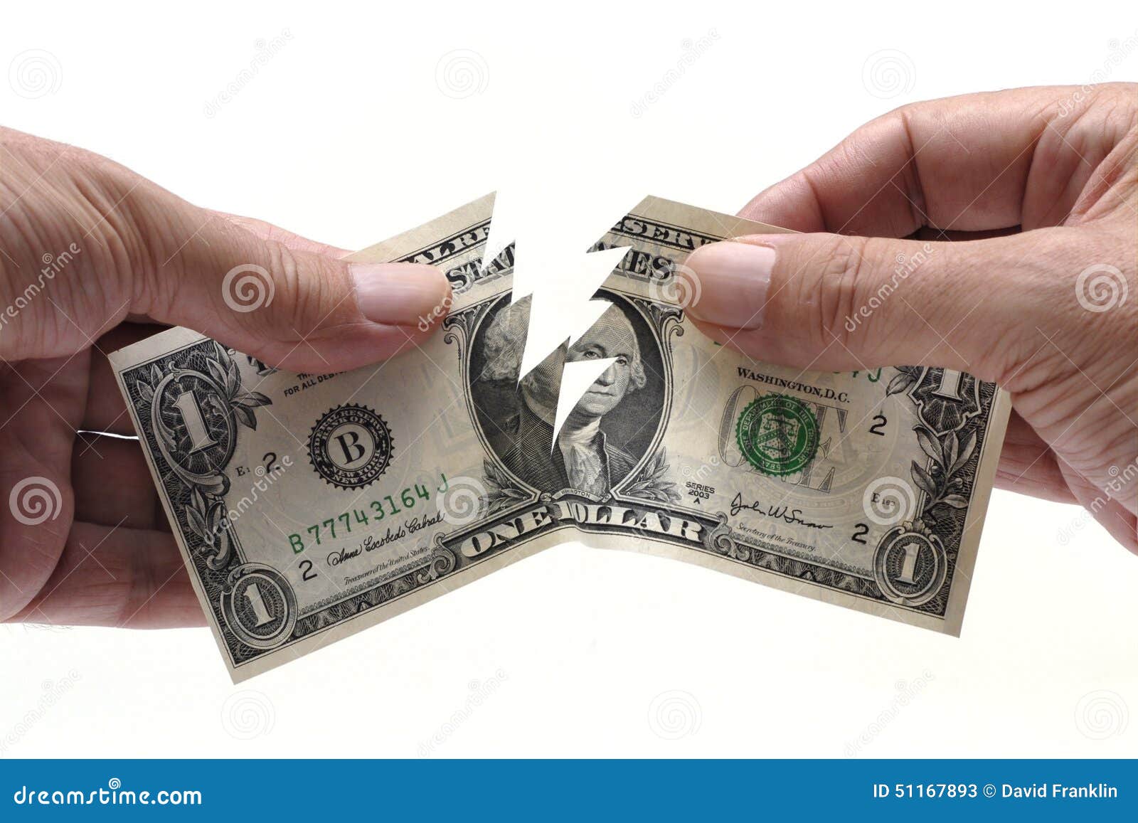 us one dollar bill being torn in half