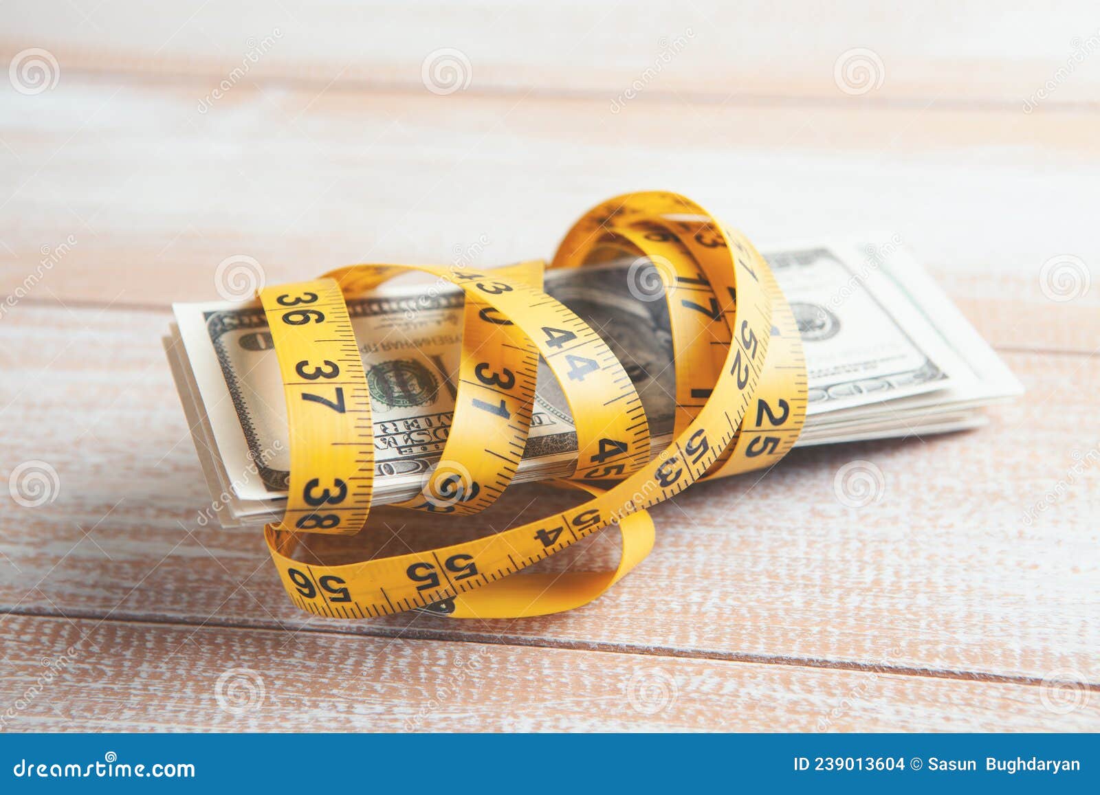 Dollar Bills Wrapped with Measuring Tape Stock Photo Image of tape