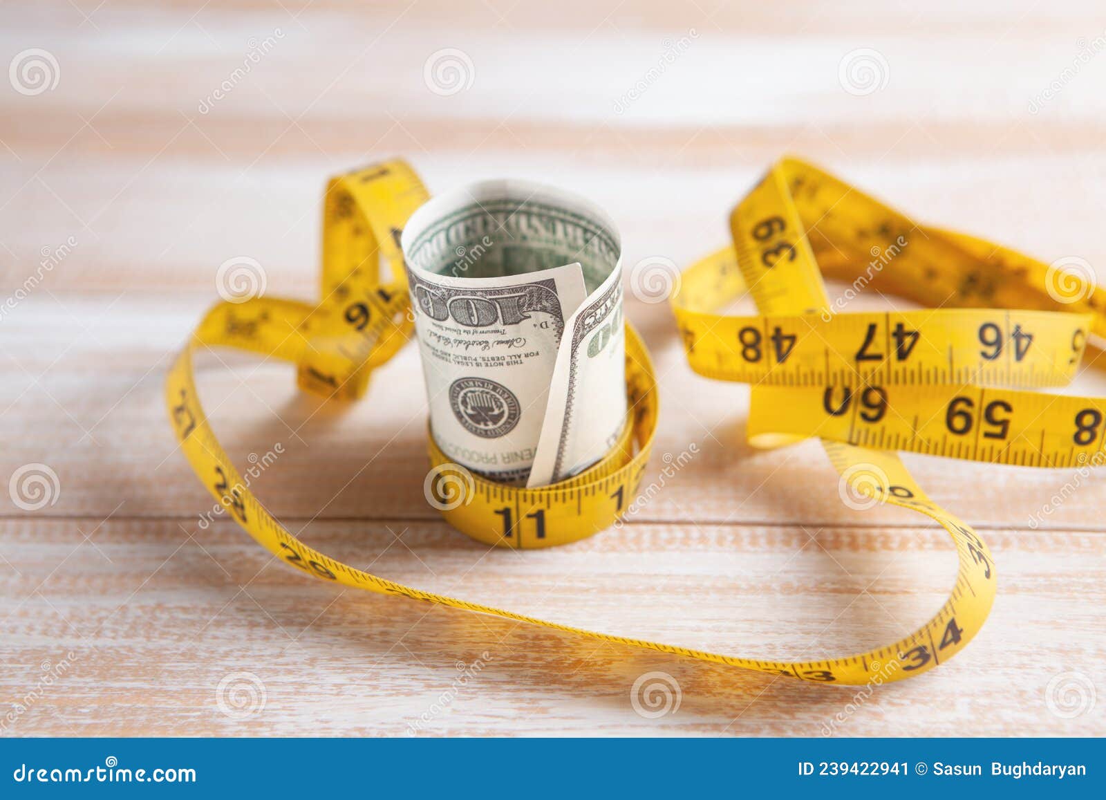 Dollar Bills Wrapped with Measuring Tape Stock Image Image of bills