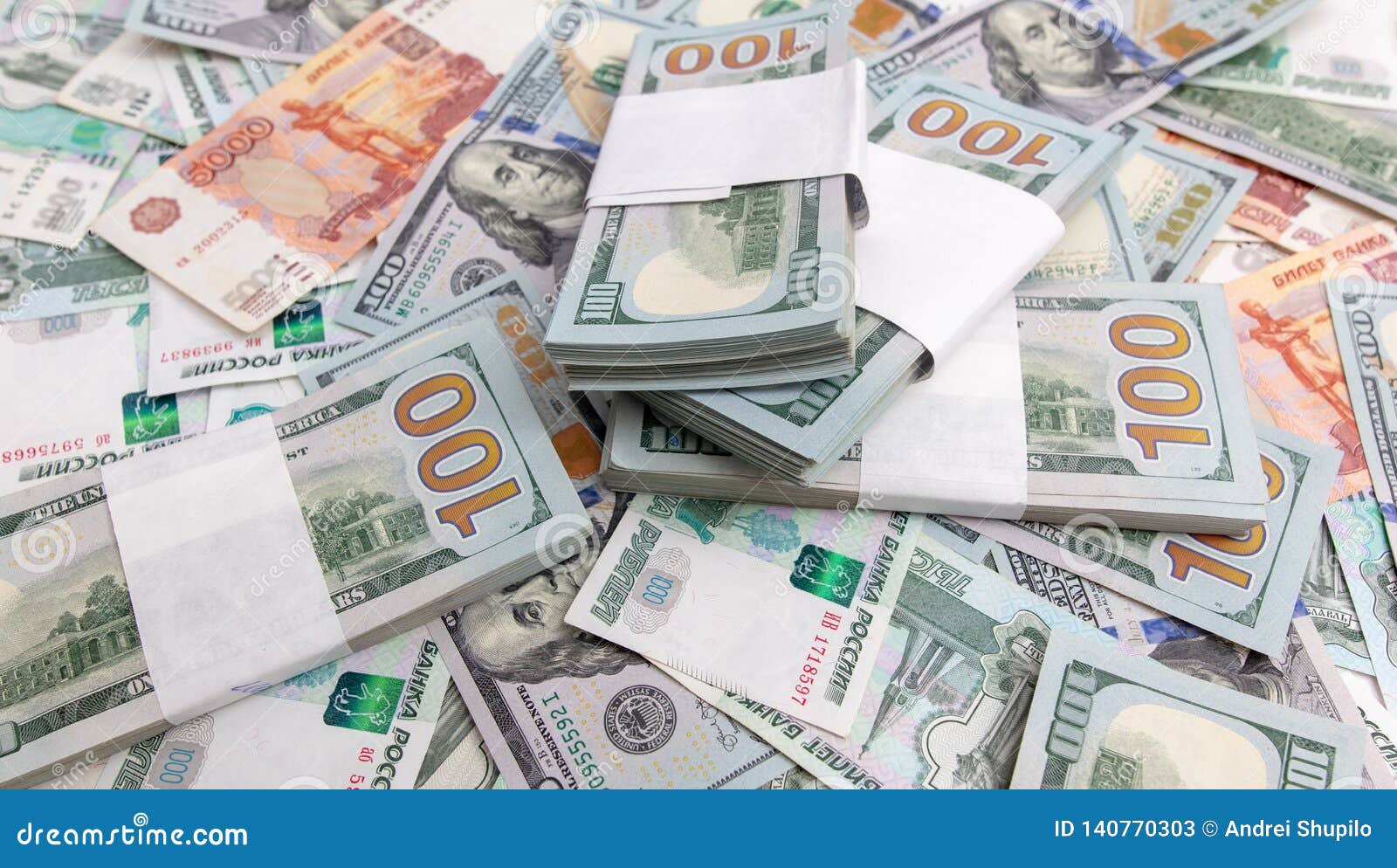 Dollars And Russian Rubles On The Table As Background Stock Image dollars-and-russian-rubles-on-the-table-as-background-stock-image