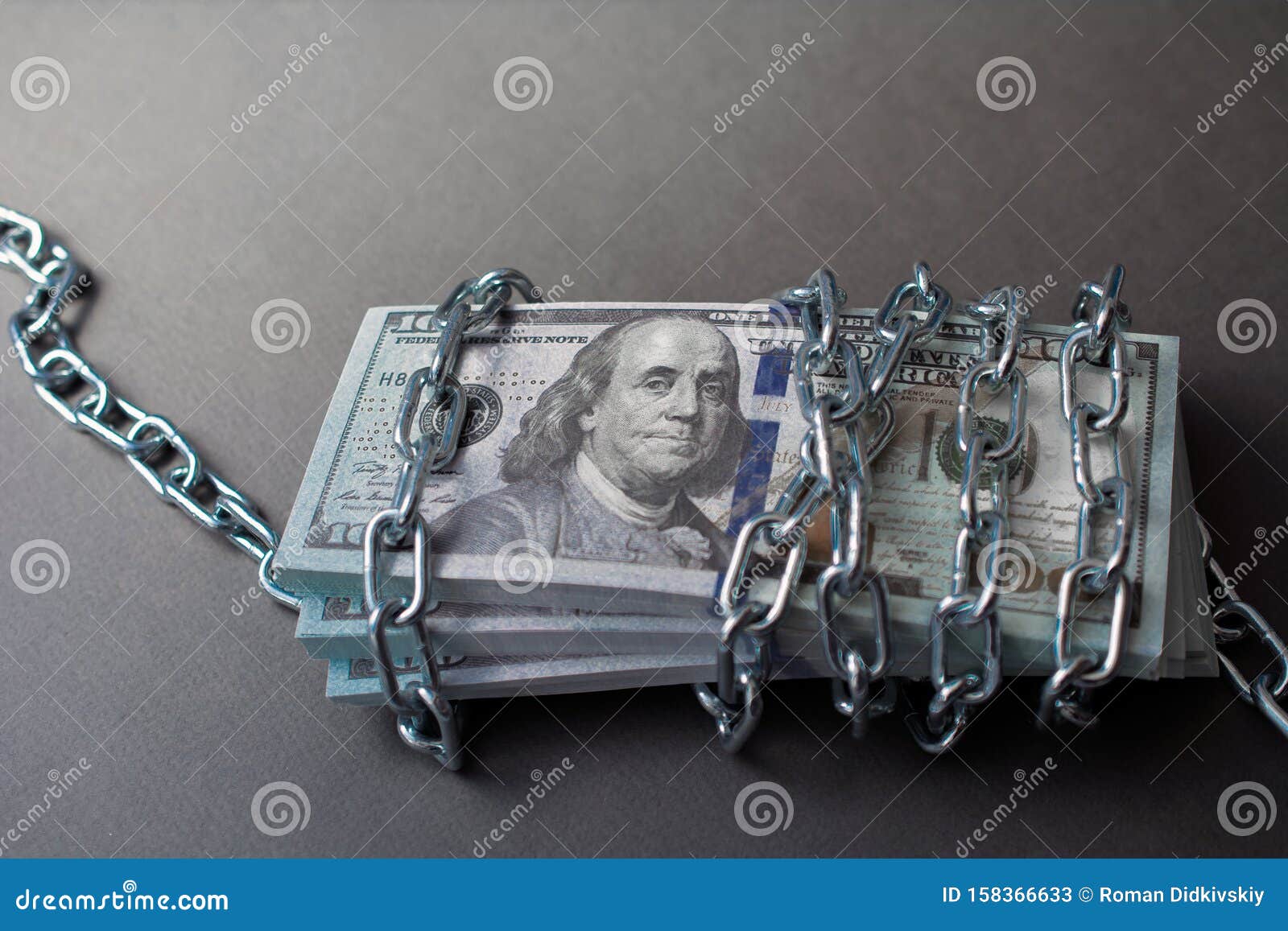 dollars tied up with a chain