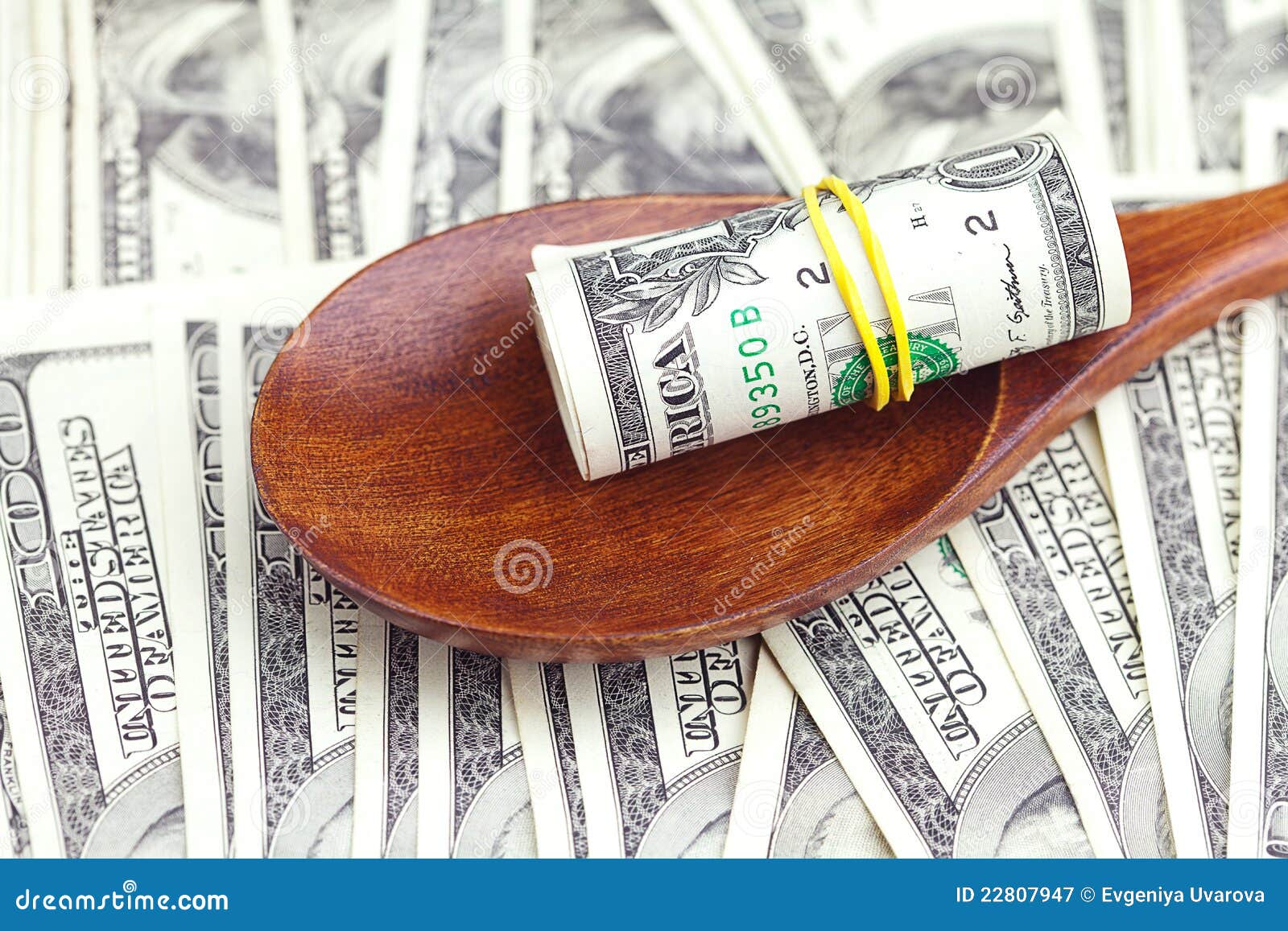 Dollars In The Wooden Spoon Stock Image Image of crunch, credit 22807947