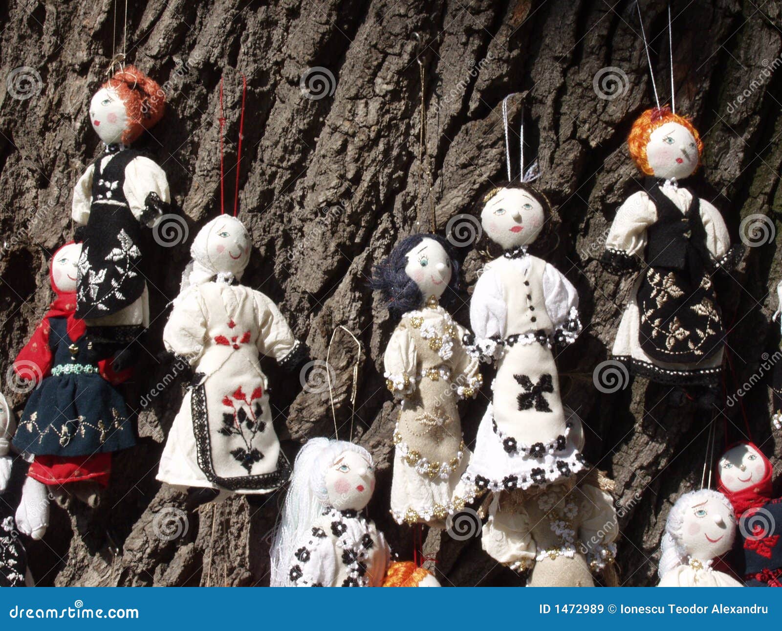 Dolls on a tree stock image. Image of hand, handcrafted 1472989
