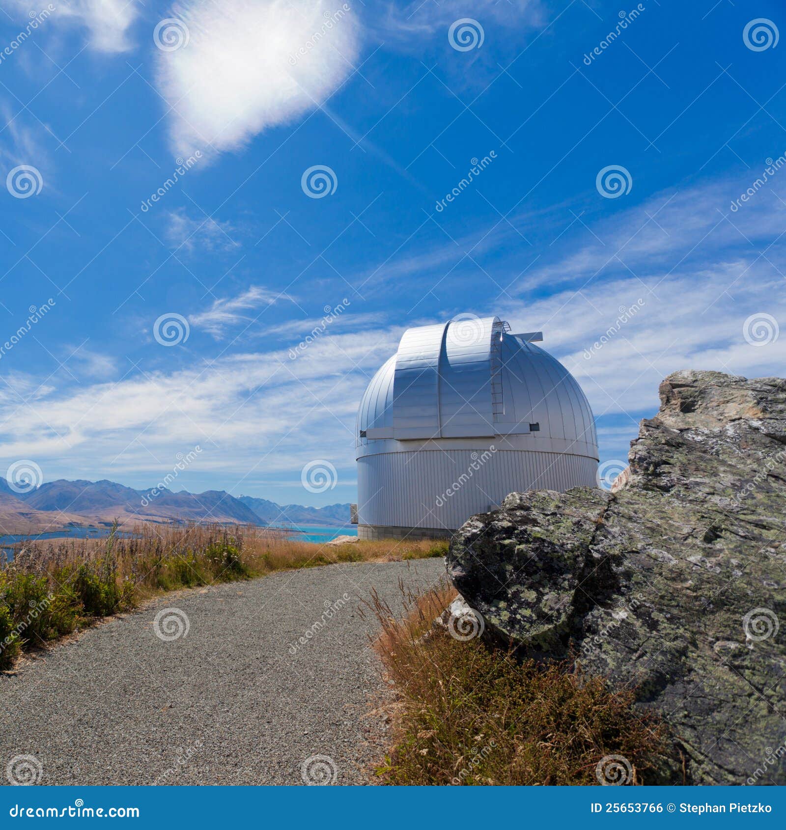 domed astronomy observatory on mountain top