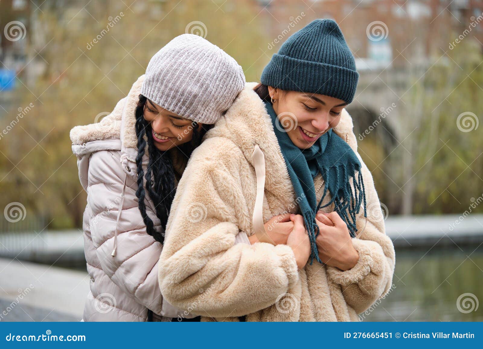 Dominican Lesbian Couple Hugging With Affection And Love At Street In Winter Stock Image 