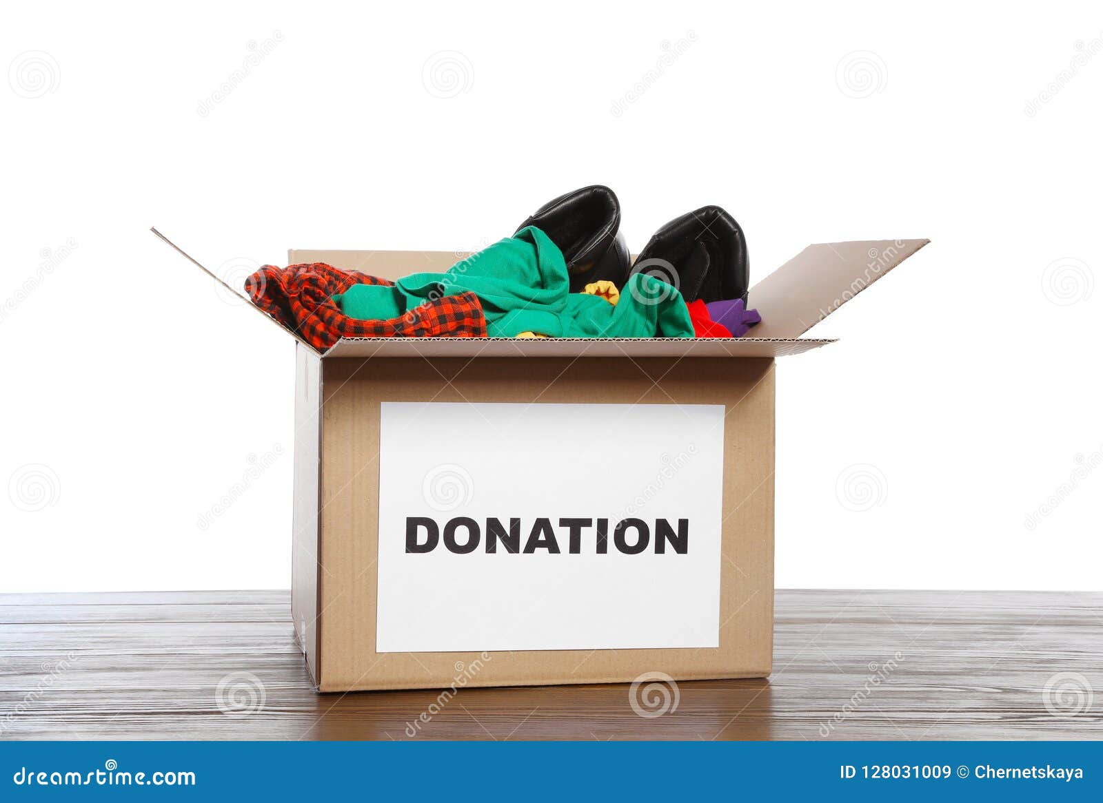 Donation Box with Clothes and Shoes on Table Stock Image Image of