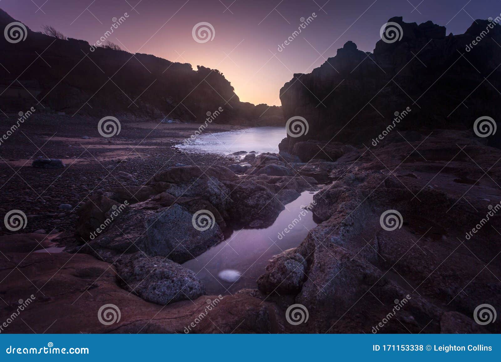 donkey rock sunrise at rotherslade bay