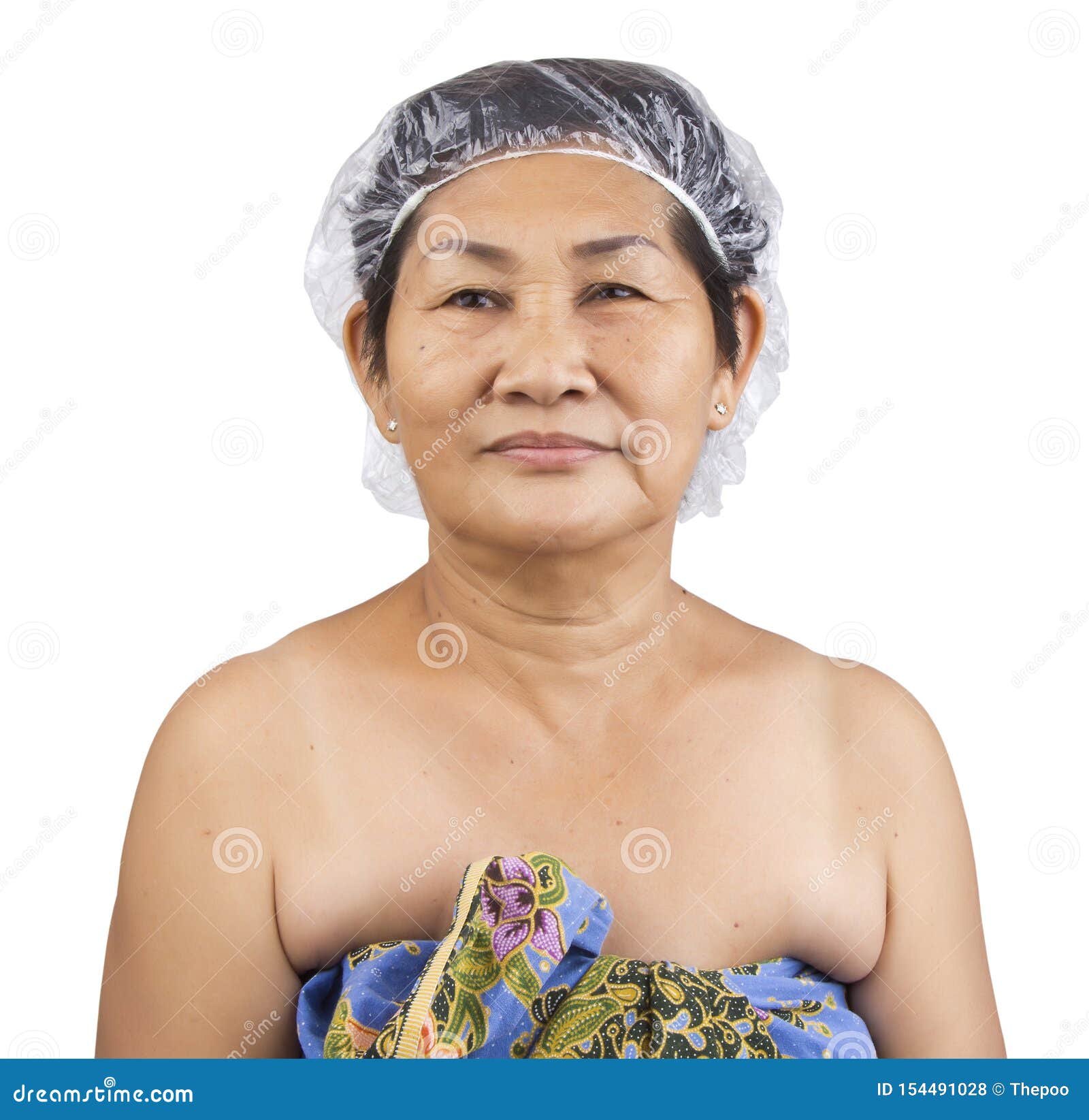 Donna Anziana Con Una Cuffia Da Doccia Fotografia Stock - Immagine di  corpo, singolo: 154491028