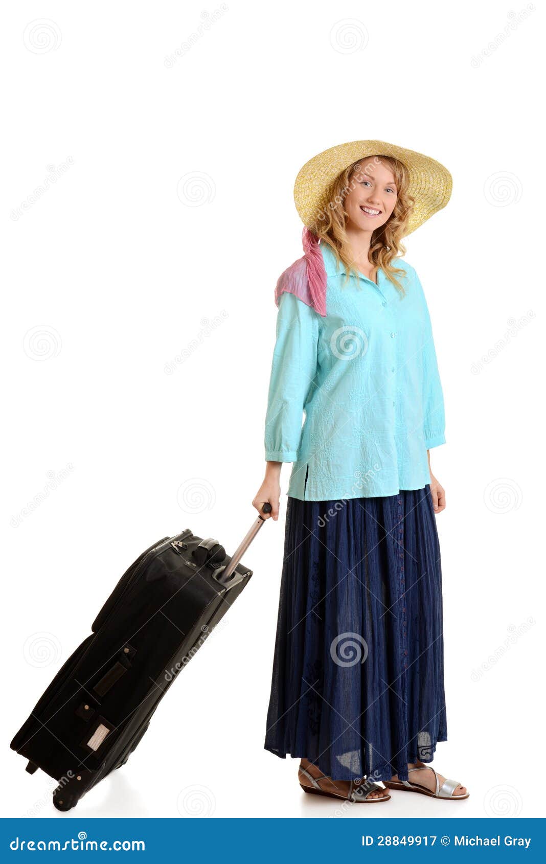 Donna con bagagli su fondo bianco