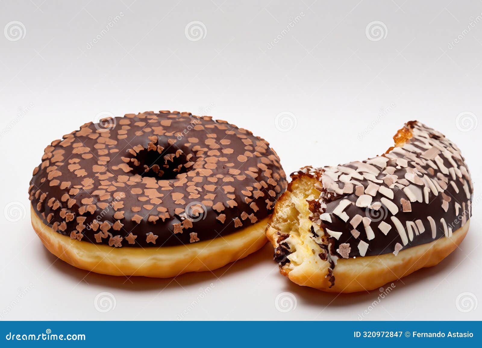 donut. one glazed donut with sprinkles. stack of different donuts. world donut day.
