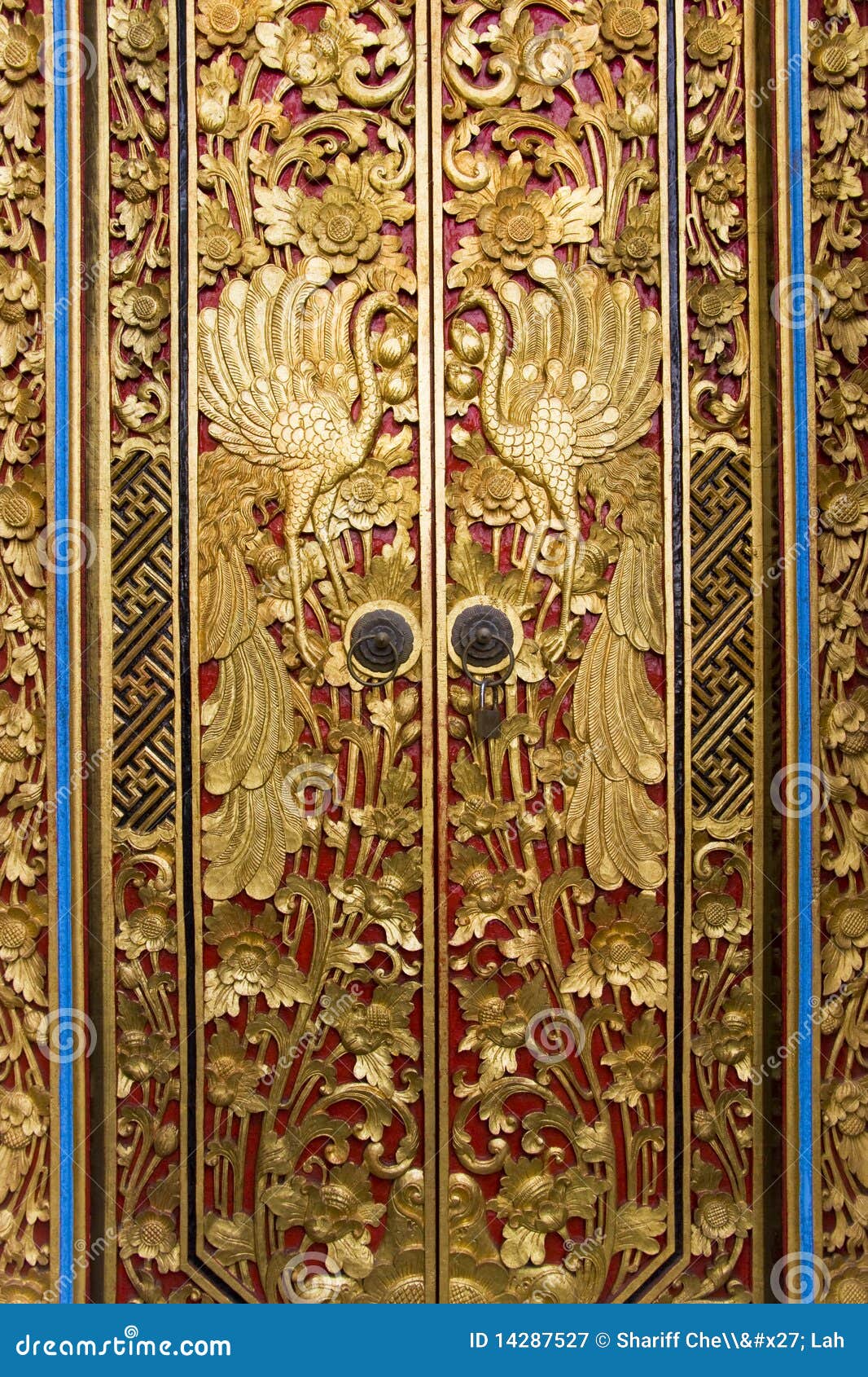 door carving at pura masceti, bali, indonesia