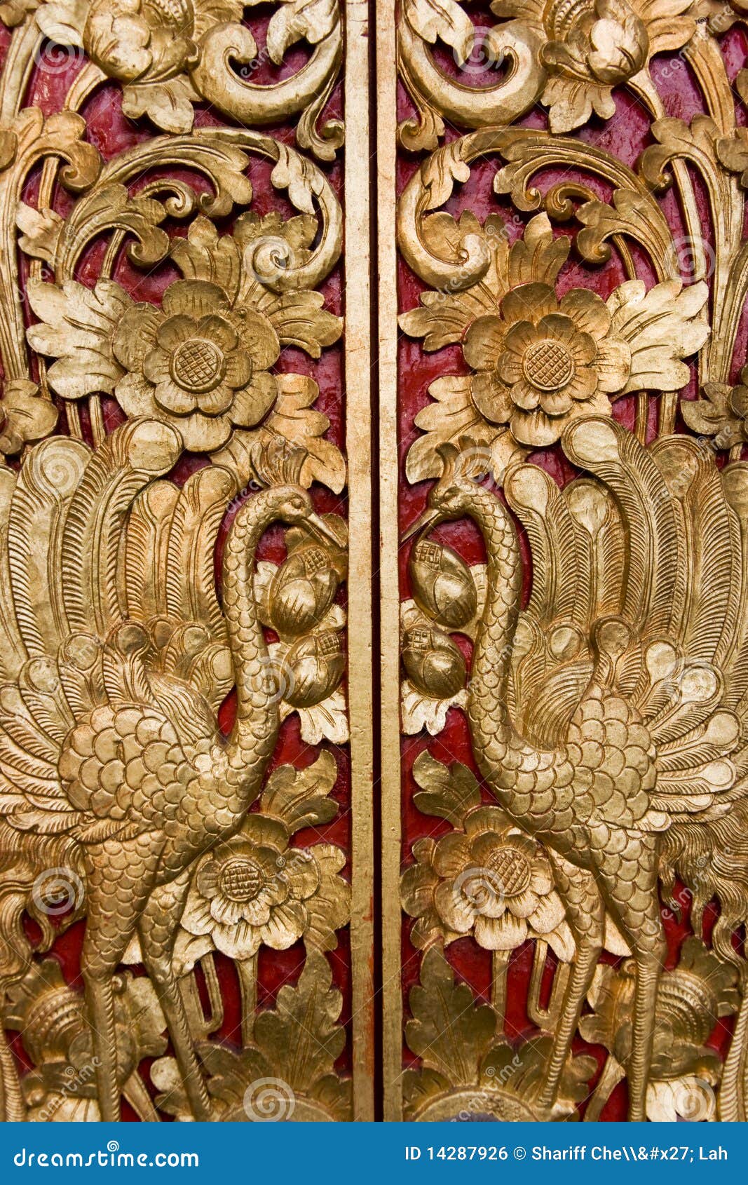 door carving at pura masceti, bali, indonesia