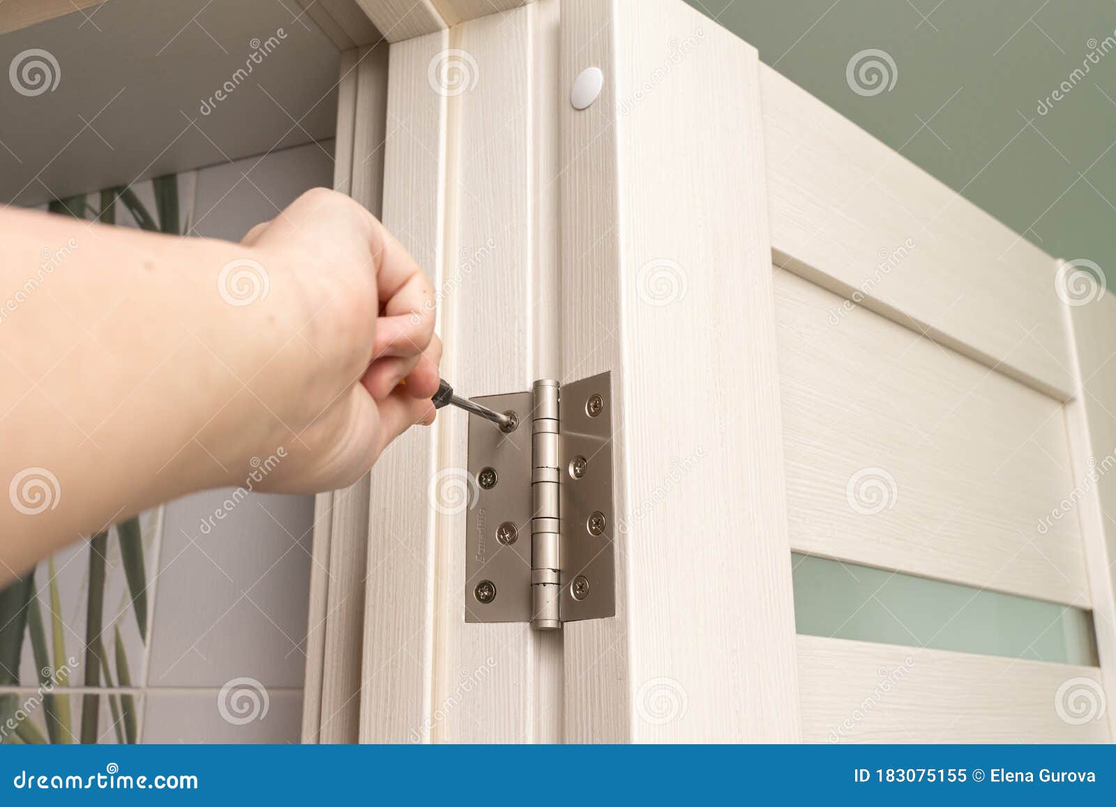 Door frame installation stock image. Image of fixing 183075155