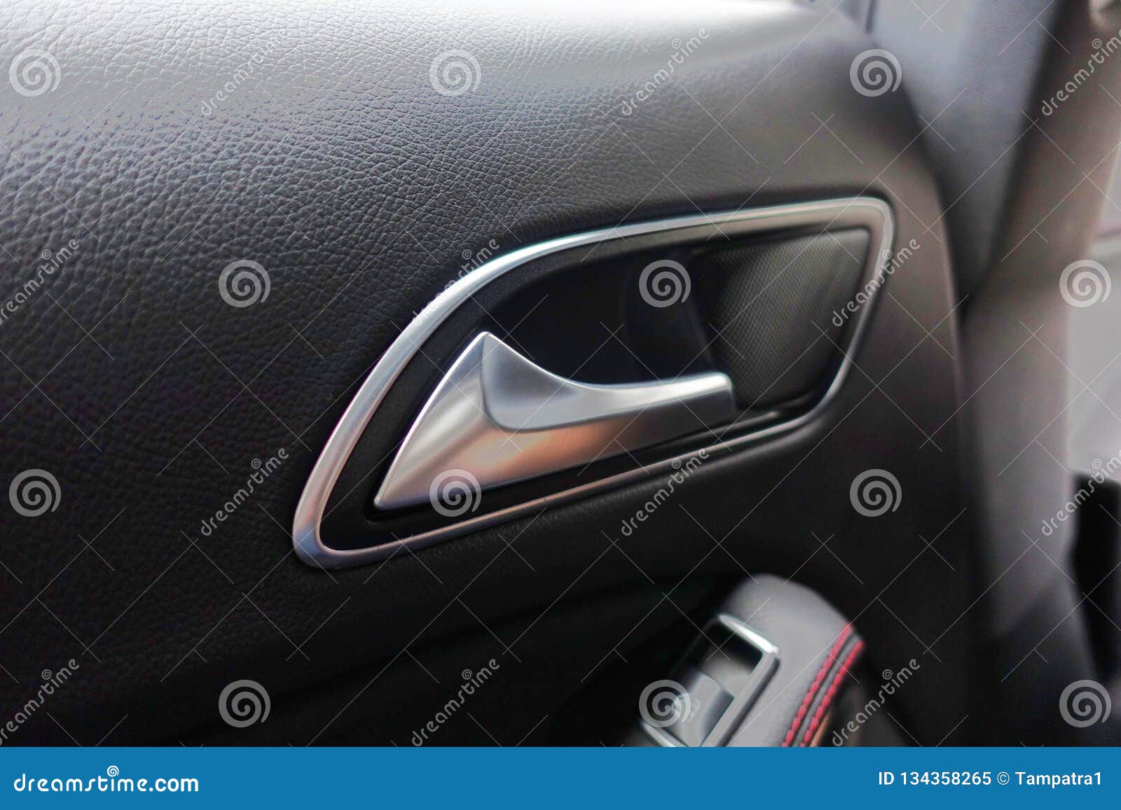 Door Handle Of Modern Car From Inside Interior With Black