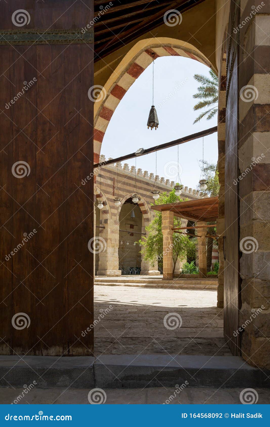 door of historic mamluk era amir aqsunqur mosque, blue mosque, reveling courtyard, cairo, egypt