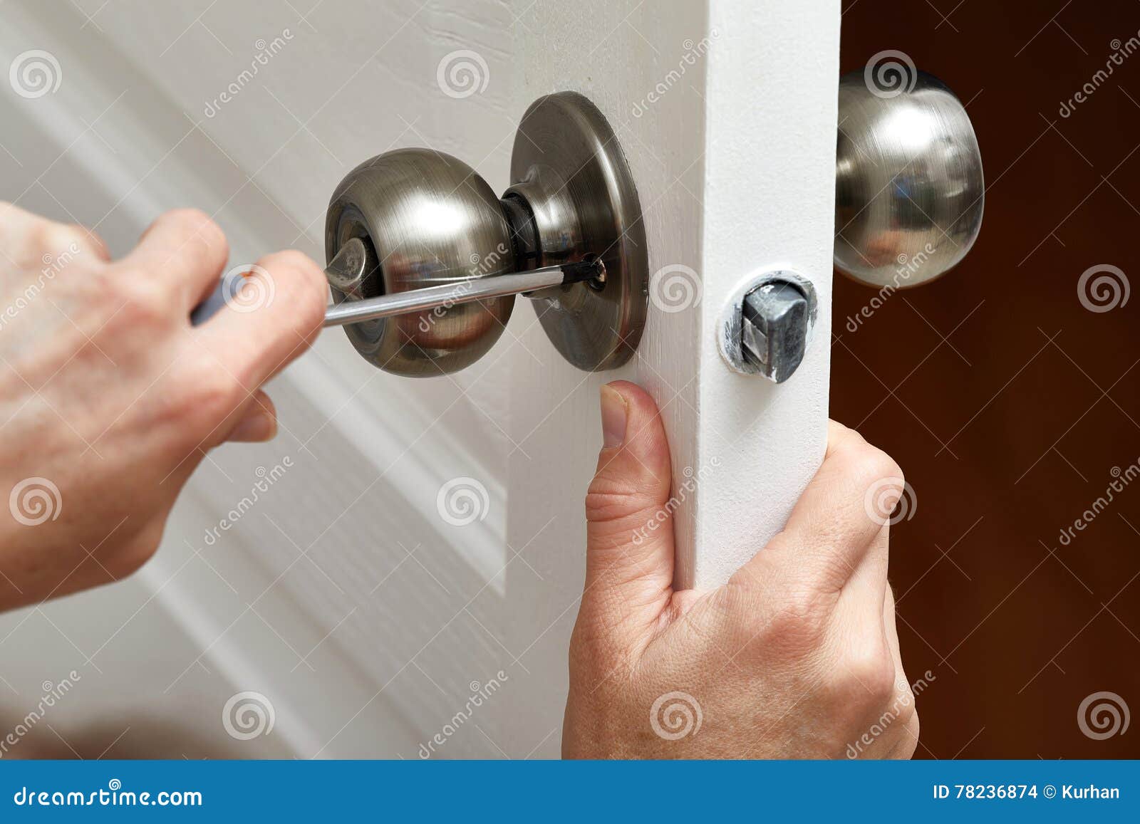 Door knob installation. stock photo. Image of installation 78236874