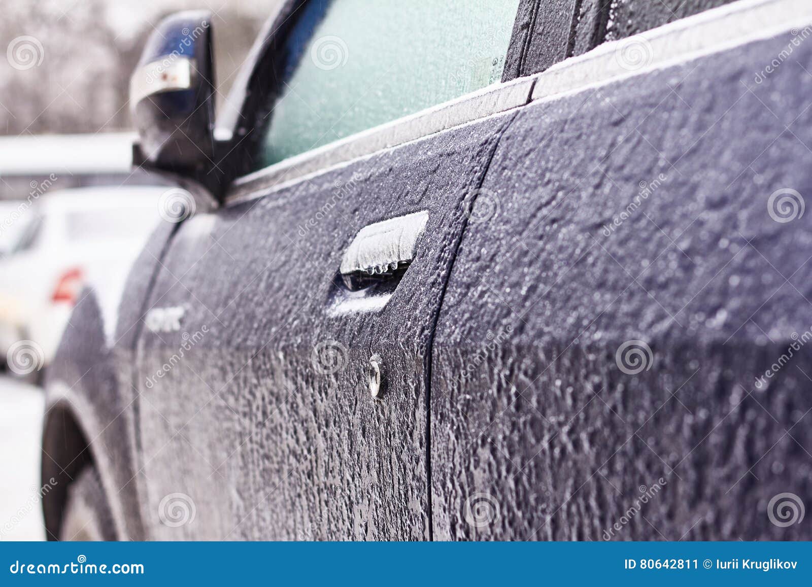 Door Knob Keyhole Of Car Covered With Snow And Ice After A