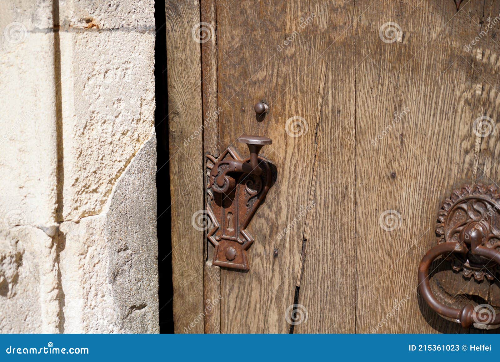 Door Lock and Door Knocker on Old Doors Photographed in Daylight Stock