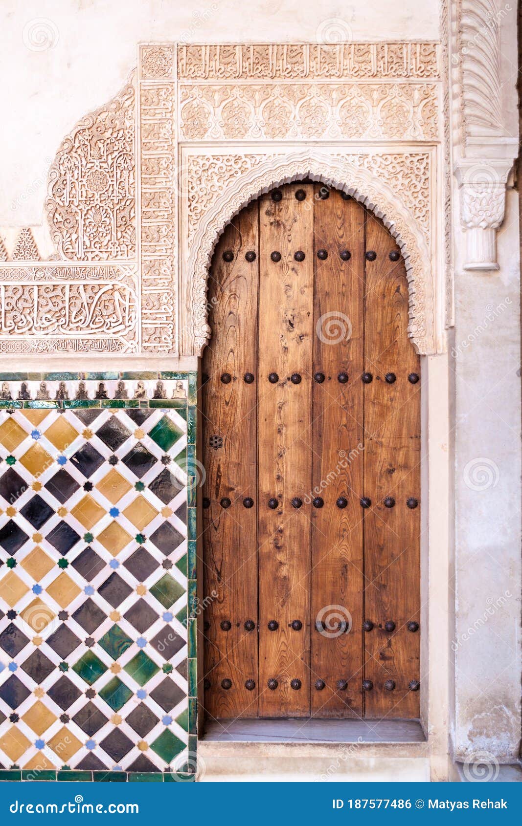 door at nasrid palaces (palacios nazaries) at alhambra in granada, spa