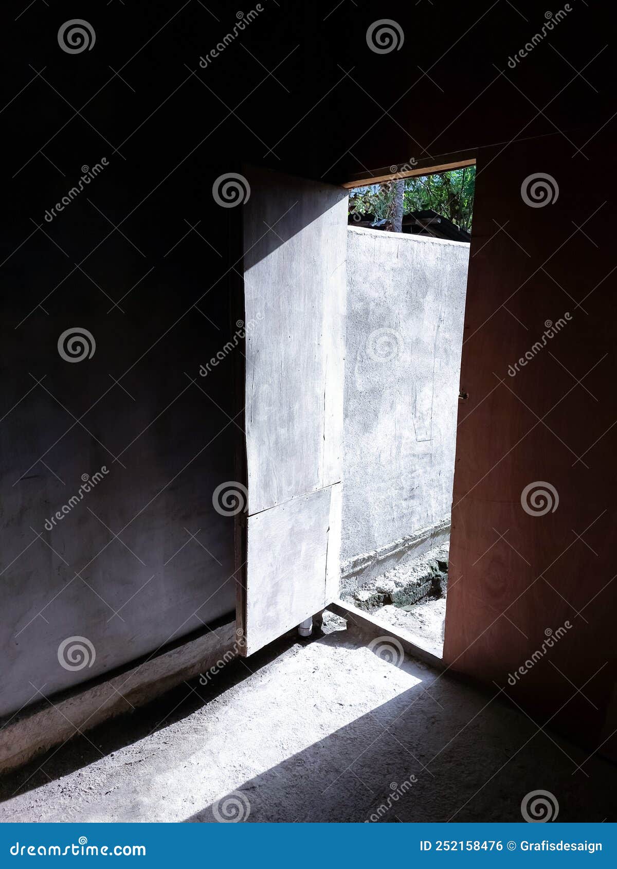 The Door Opened with a Dark Room and Light Stock Photo Image of