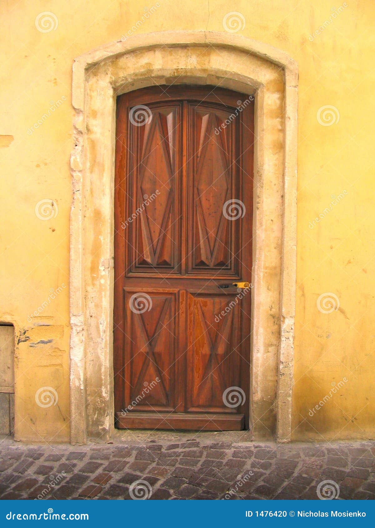 Door in the wall stock photo. Image of architectural, village - 1476420
