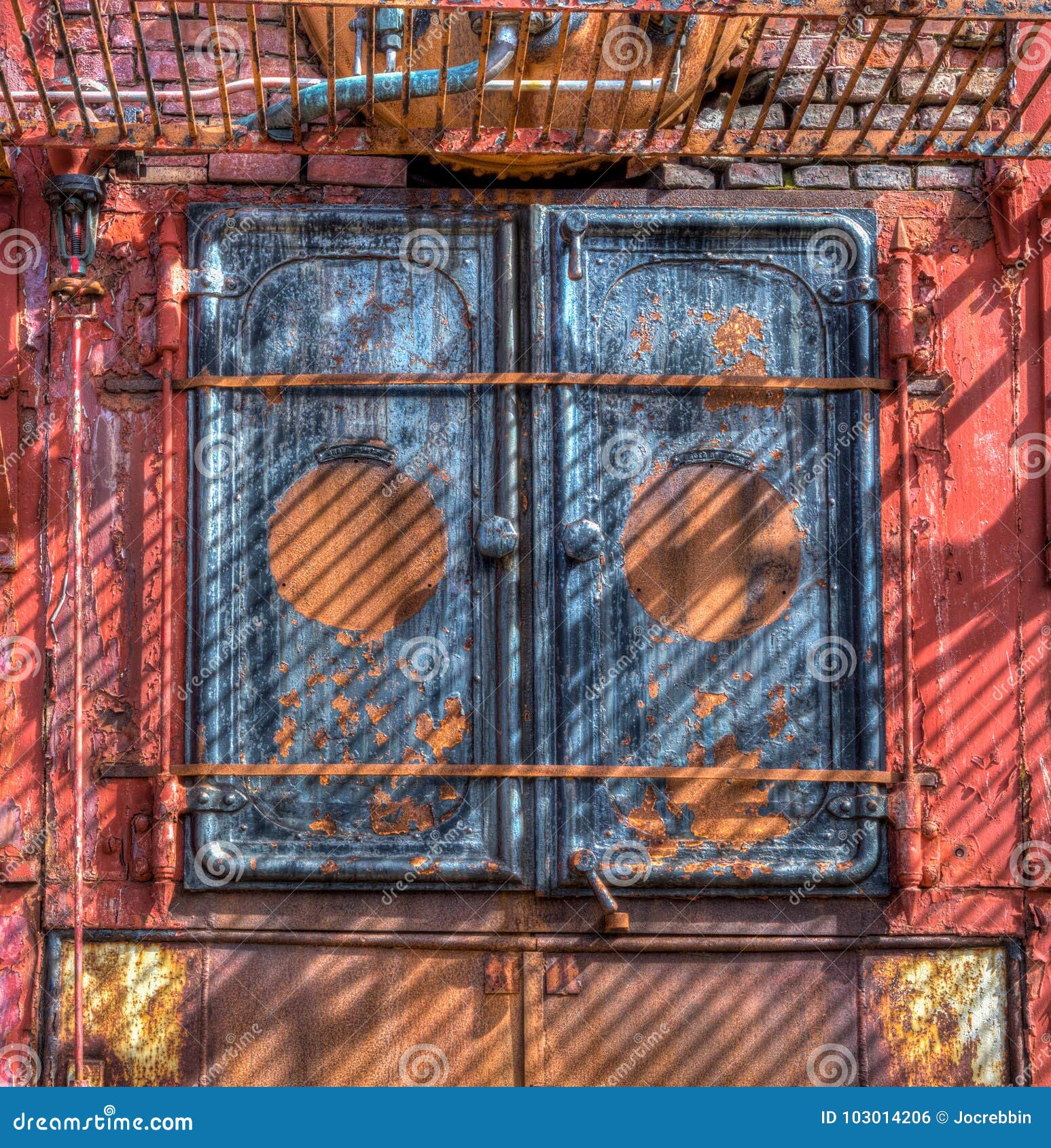 doors of antique whaling boiler rusts from lack of use in gryviken, south georgia