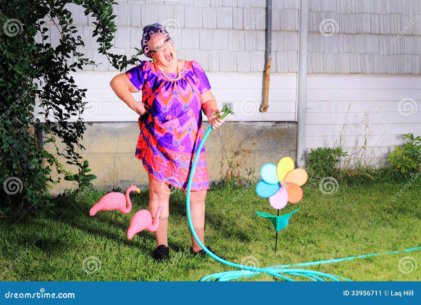 Grandma Gardener Taking A Break To Admire The View Stock Image 42195169