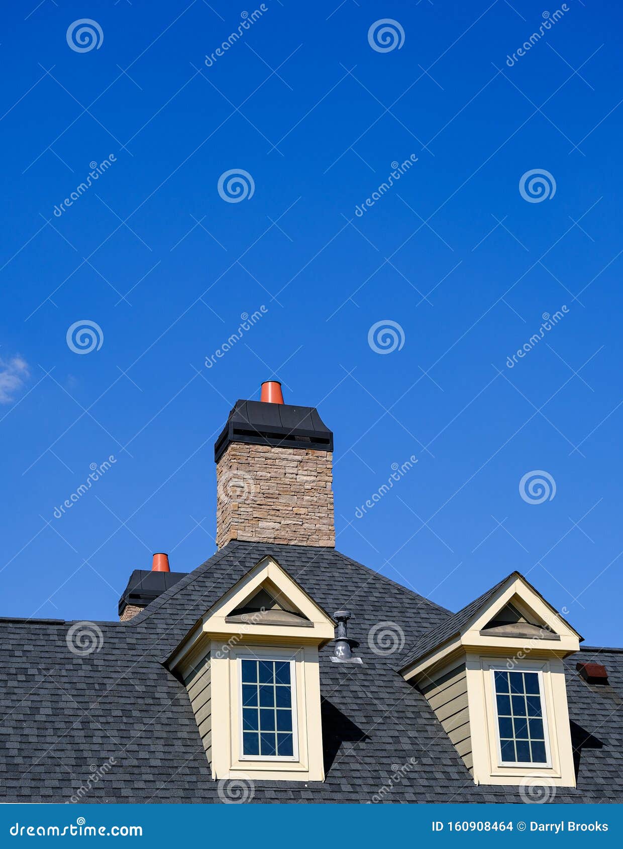 Dormers and Stone Chimney stock photo. Image of shingles 160908464