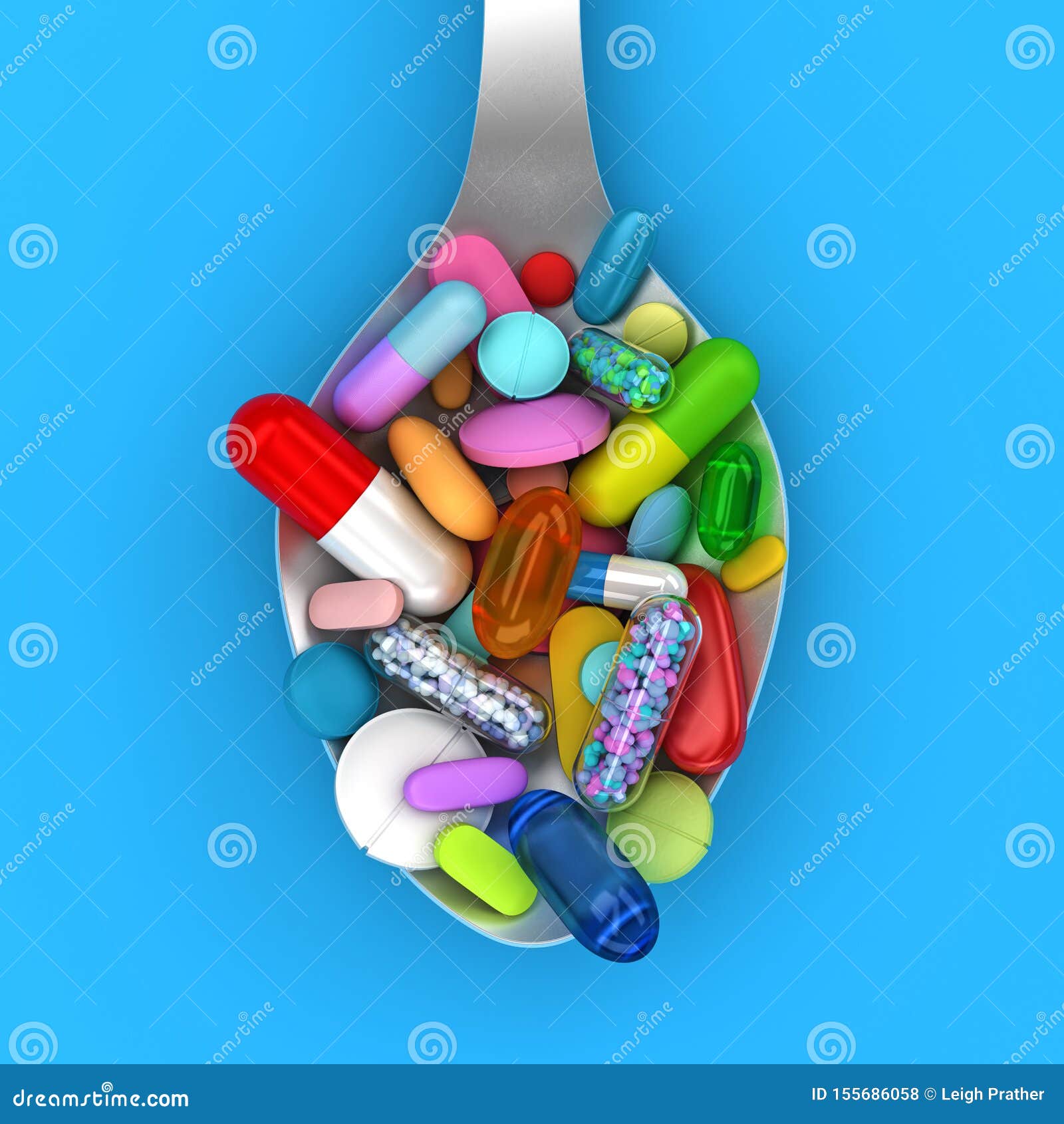 dose of colorful pills in spoon