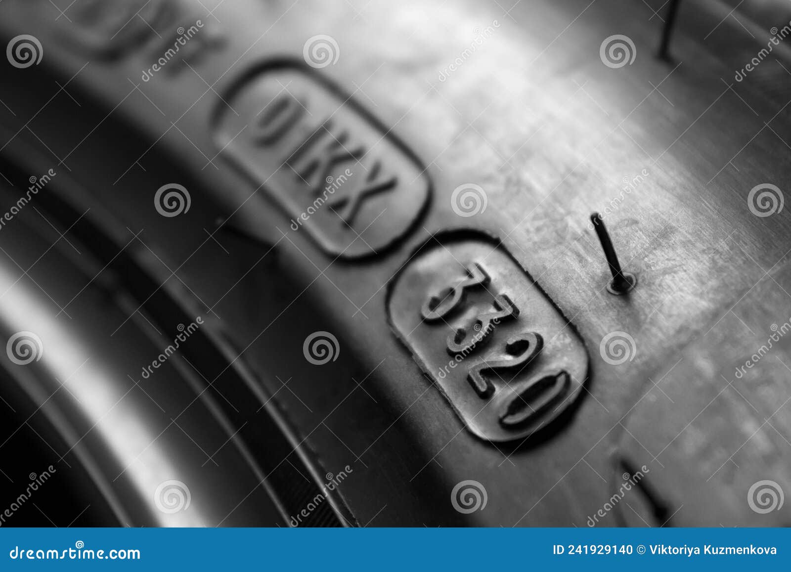 dot code and date of production of the tire on the sidewall of the wheel. close up. tire shelf life