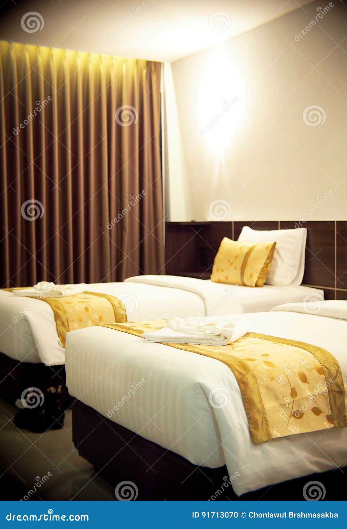 Double Bed Room With Gold Brown Yellow Colour Pillows Stock