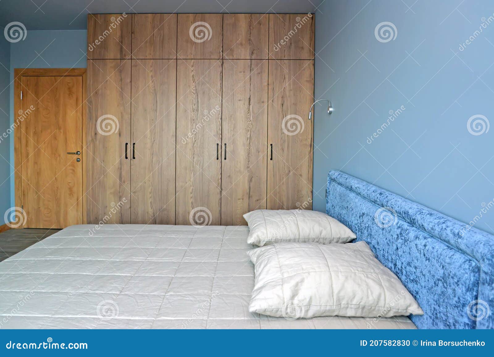 Double Bed and Wardrobe in a Modern Bedroom Stock Photo Image of