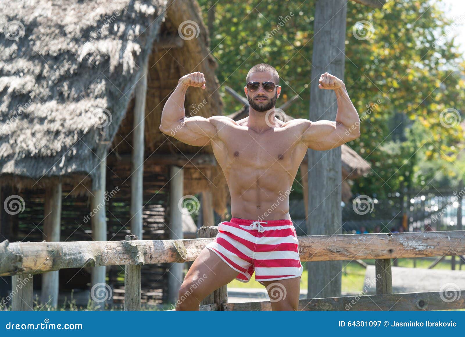 Double Biceps Pose Outdoors In Summer Stock Image Image Of Exercising Bodybuilding 64301097 