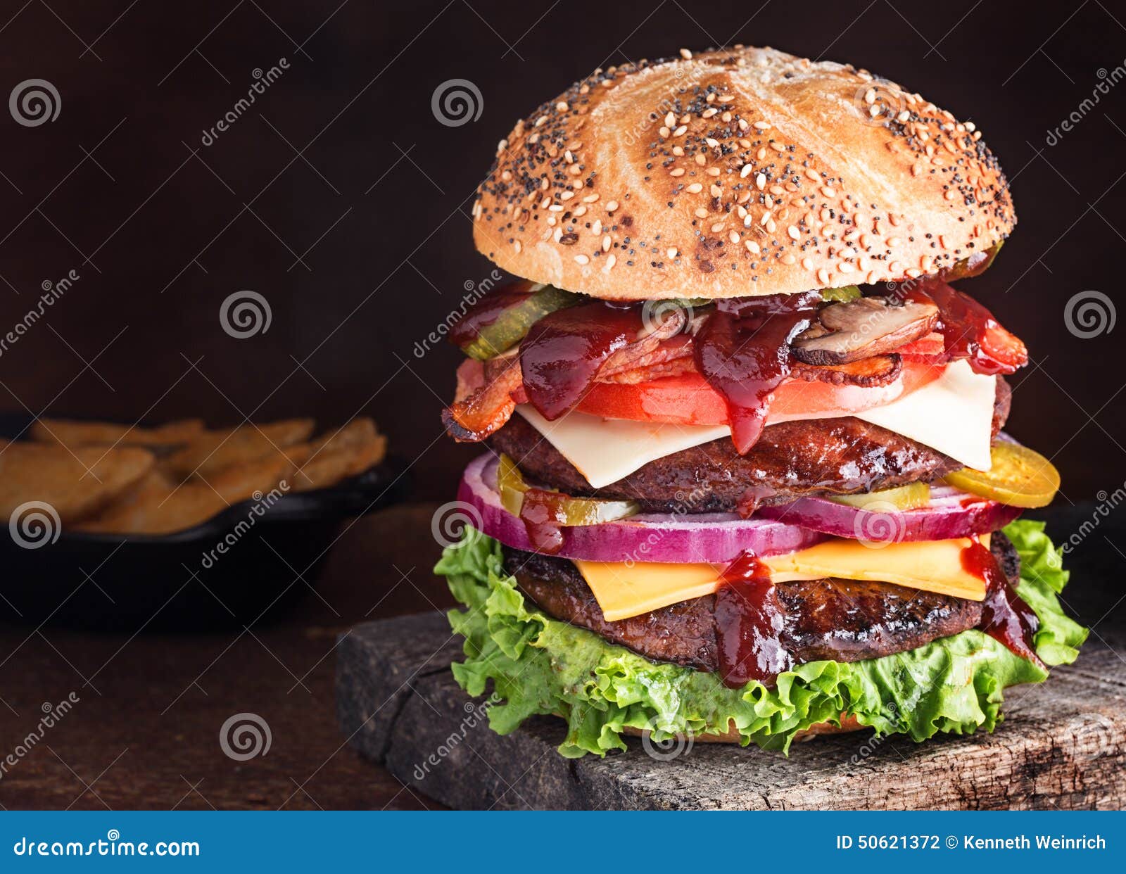Double cheeseburger deluxe stock photo. Image of pickle - 50621372