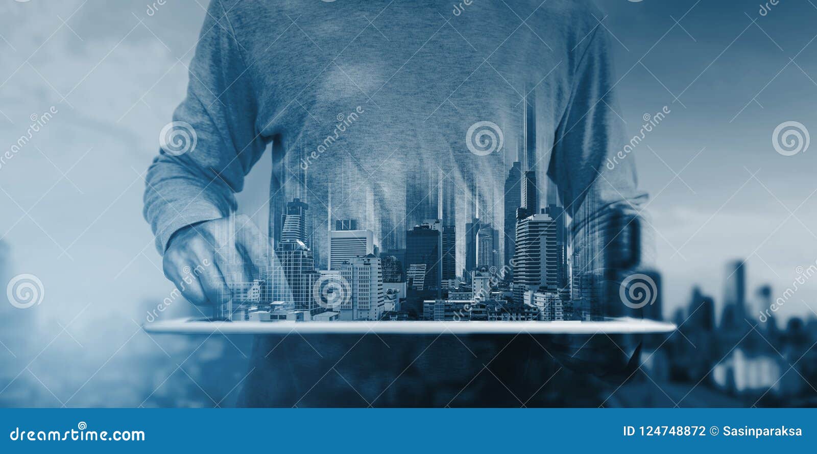 double exposure, a man using digital tablet, and modern buildings hologram. real estate business and building technology concept