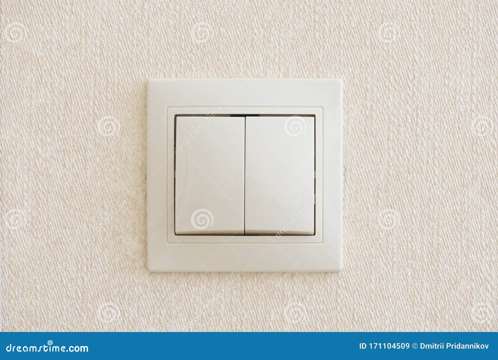 Double Light Switch in Beige Color, Built into the Wall Stock Image