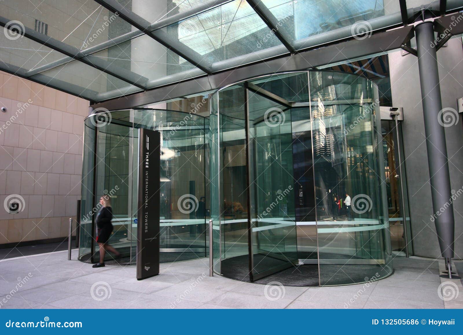 Double Modern Frameless Glass Revolving Doors Covered By