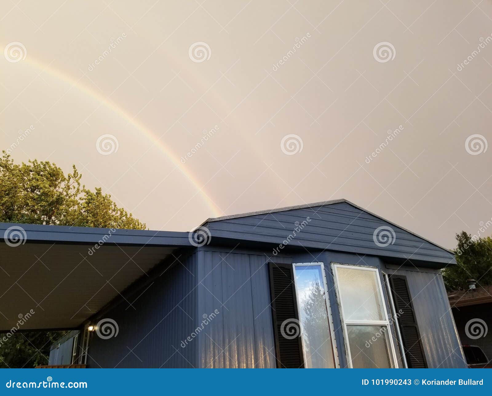 Double rainbow trailer stock image. Image of rainbows 101990243