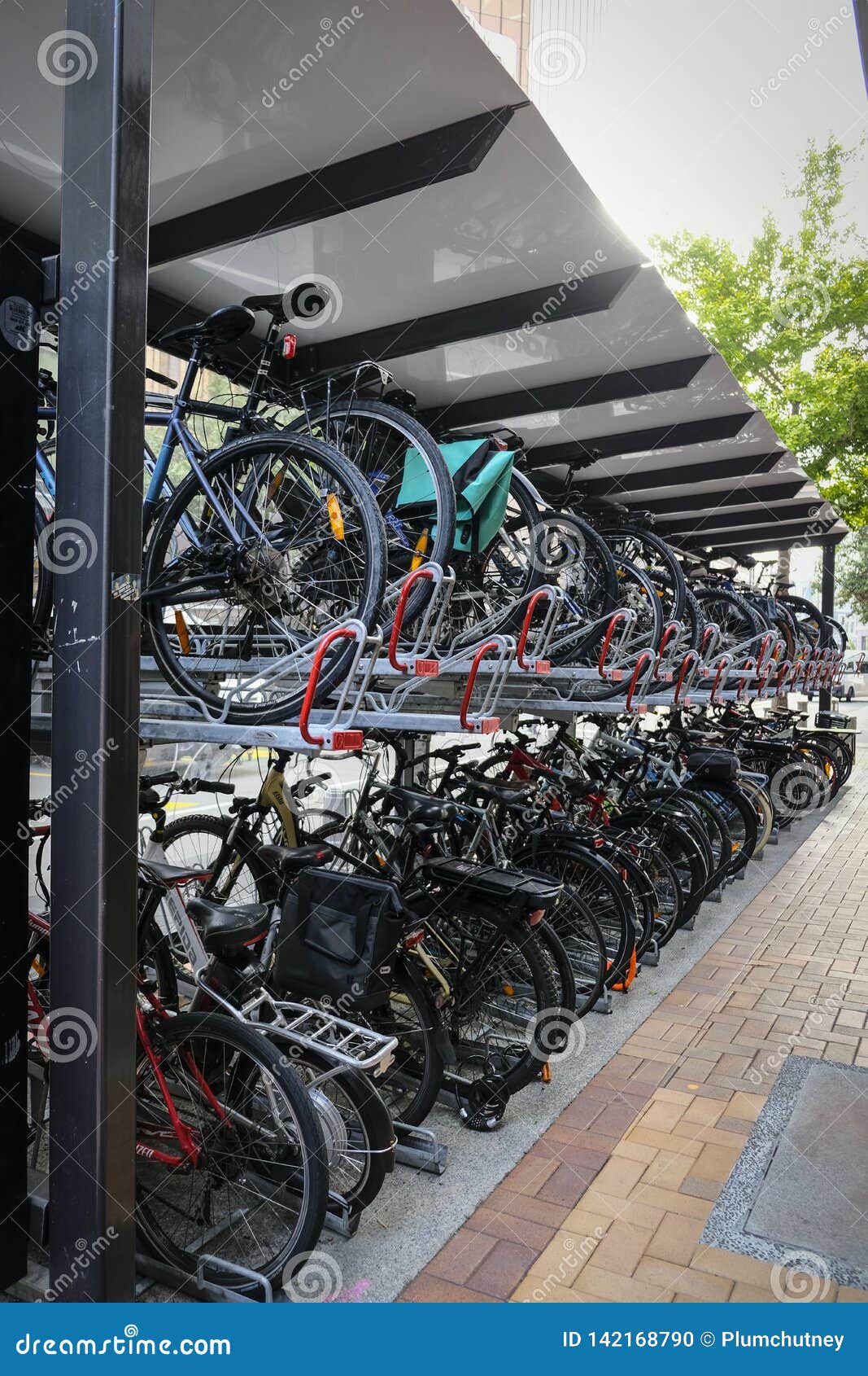 Double Storey Bike Rack In City. Efficient Storage And