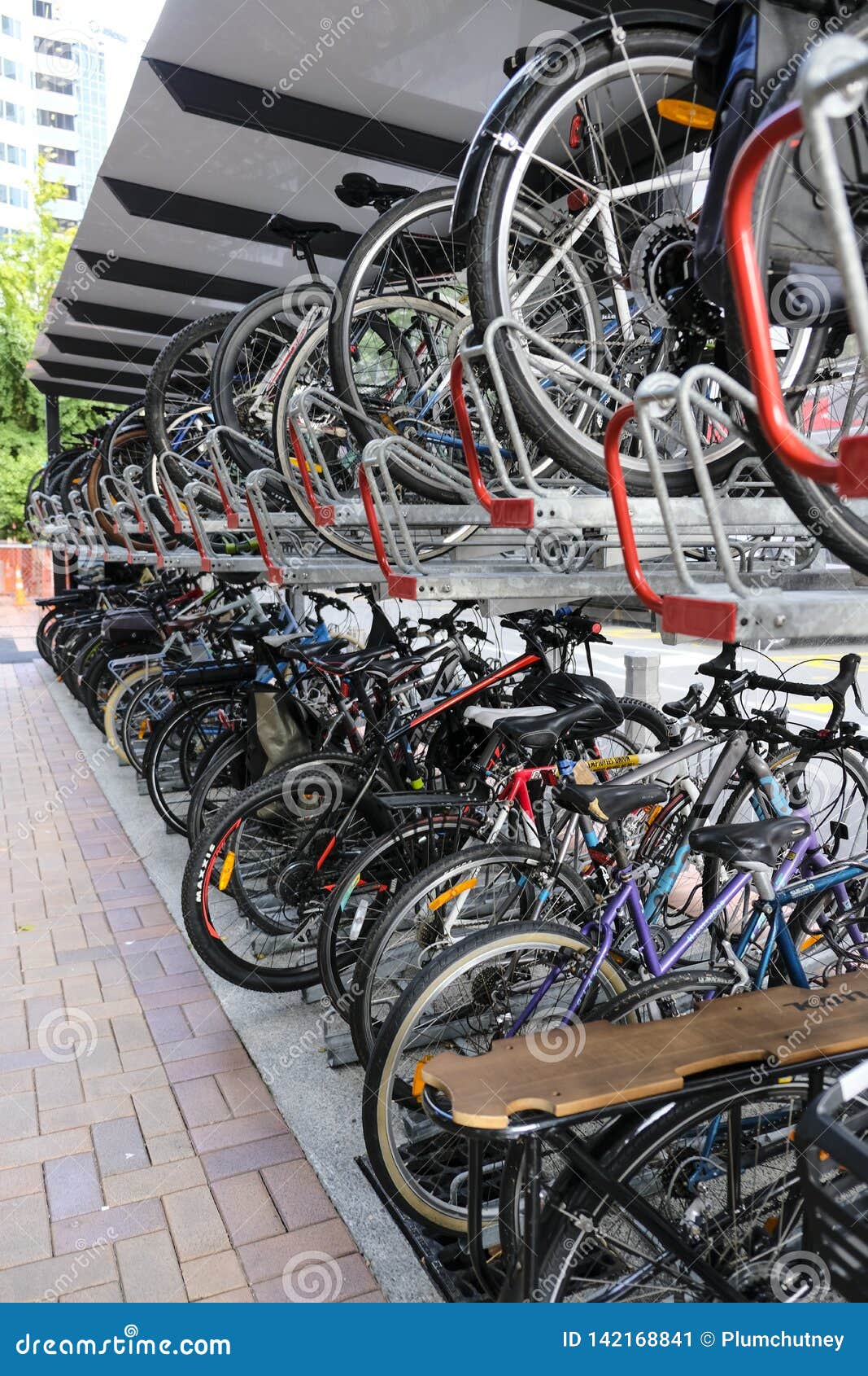 Double Storey Bike Rack In City. Efficient Storage And