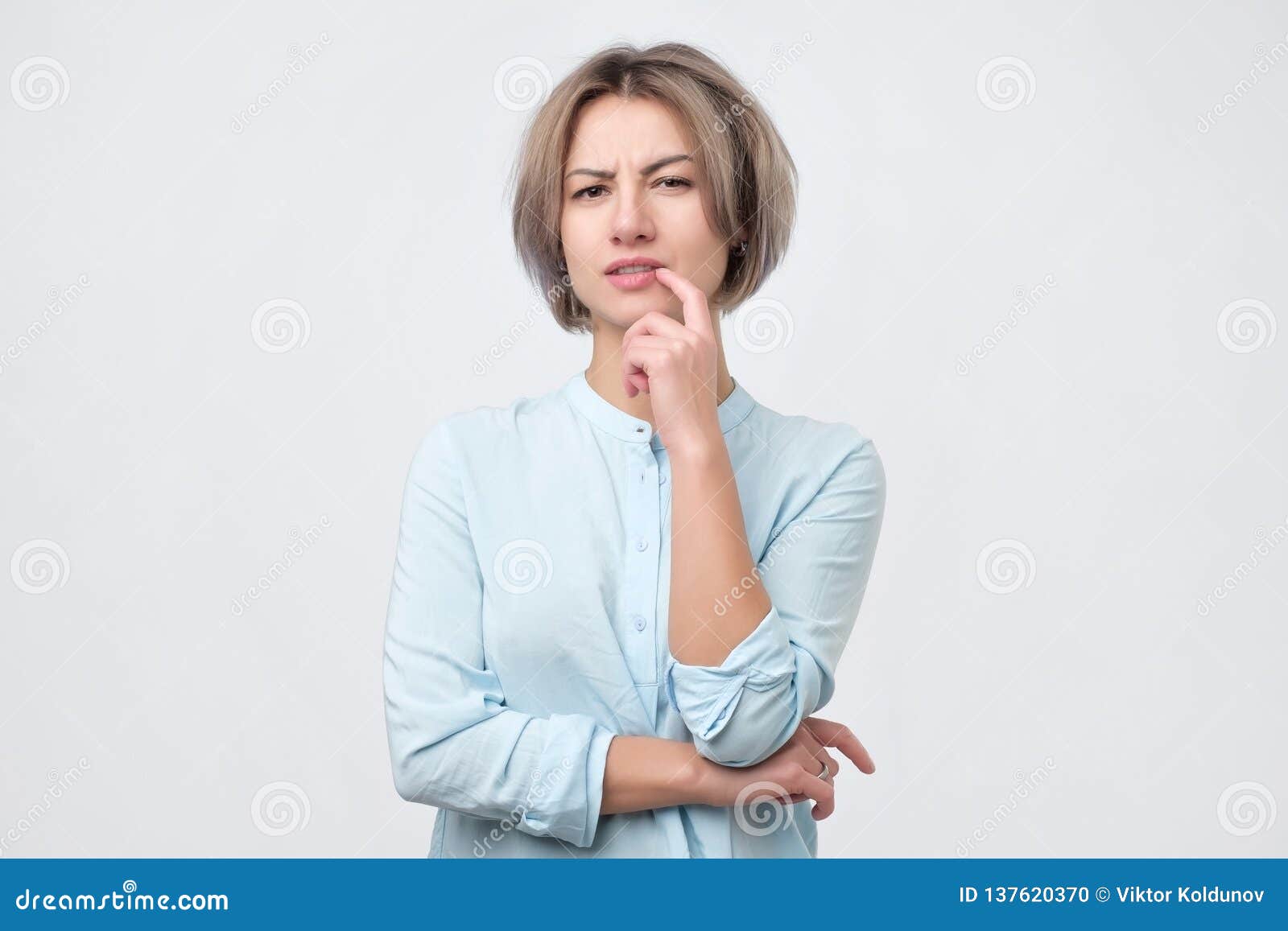 doubtful, thoughtful woman remembering something. young emotional woman.