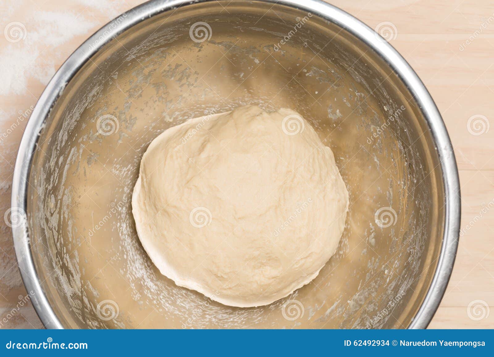 Dough in a mixing bowl stock photo. Image of life, wooden 62492934
