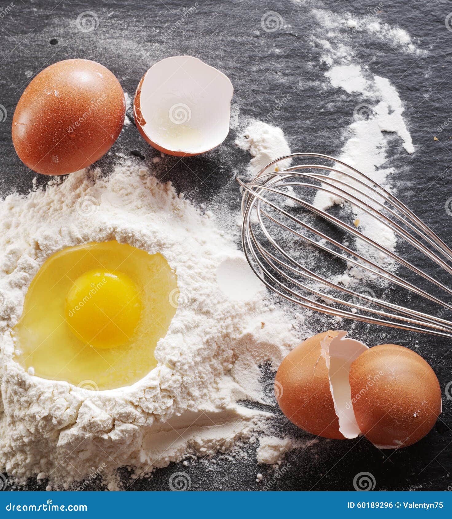 Dough Preparation. Baking Ingredients Egg and Flour. Stock Photo