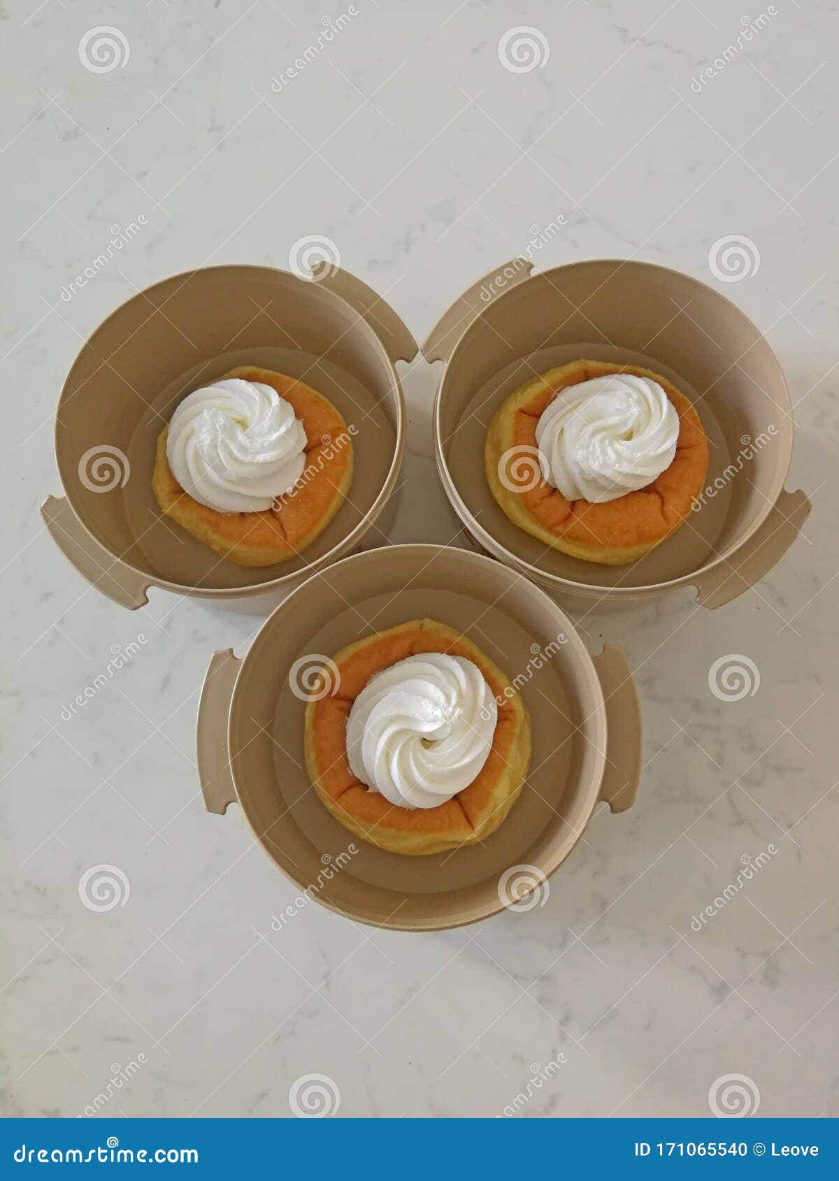 Doughnut with Whipped Cream Put in Plastic Containers Stock Photo