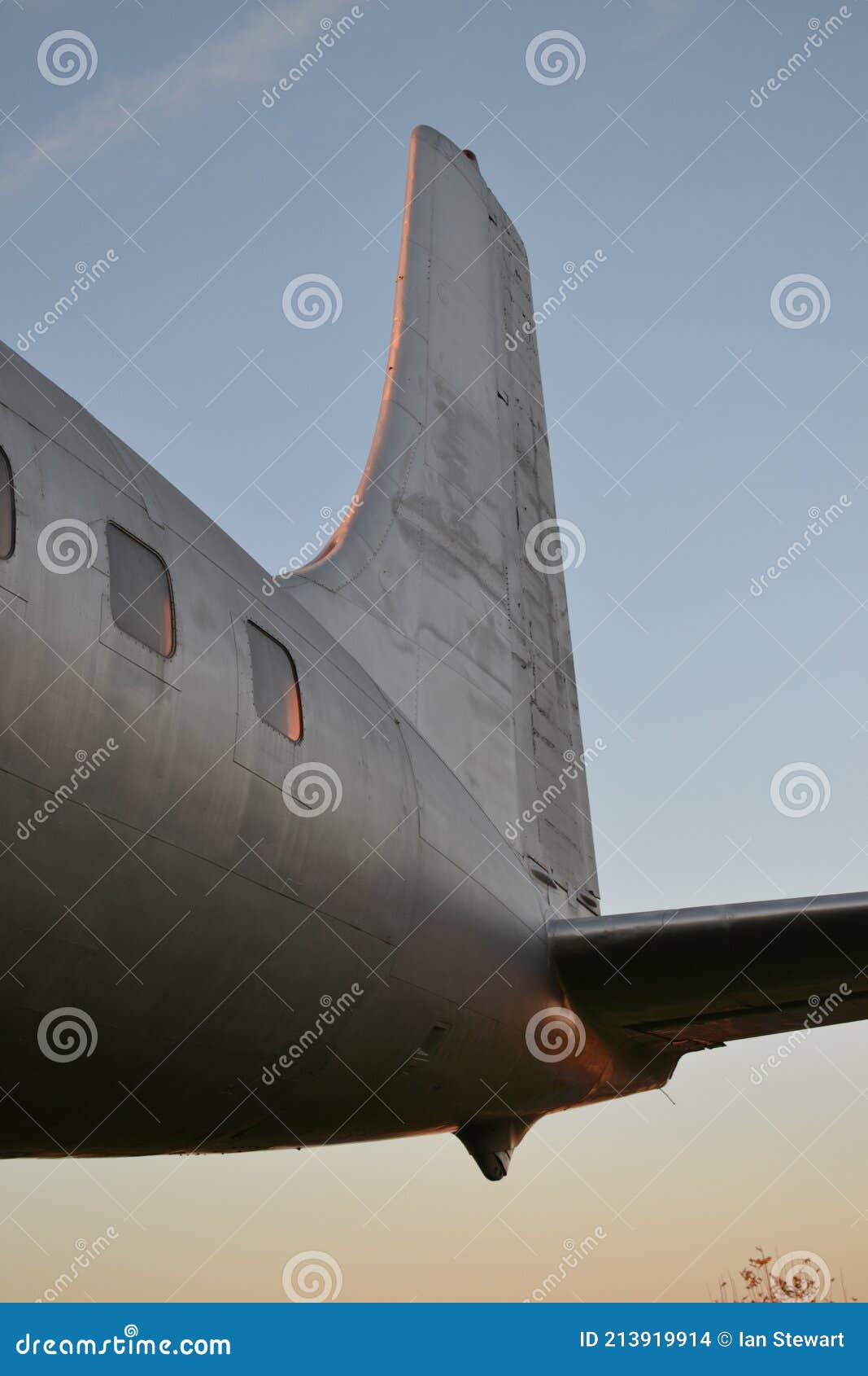 douglas dc-7 transport aircraft on the bank of the guadalquivir river, cÃÂ³rdoba, spain.