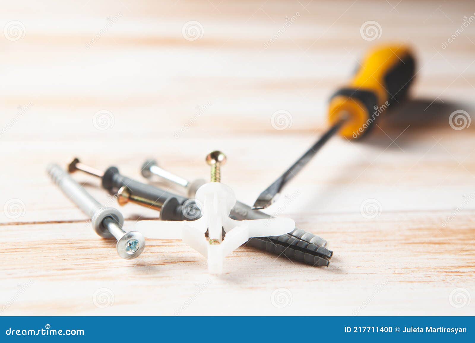 Dowels and Screwdriver on the Table Stock Photo Image of improvement