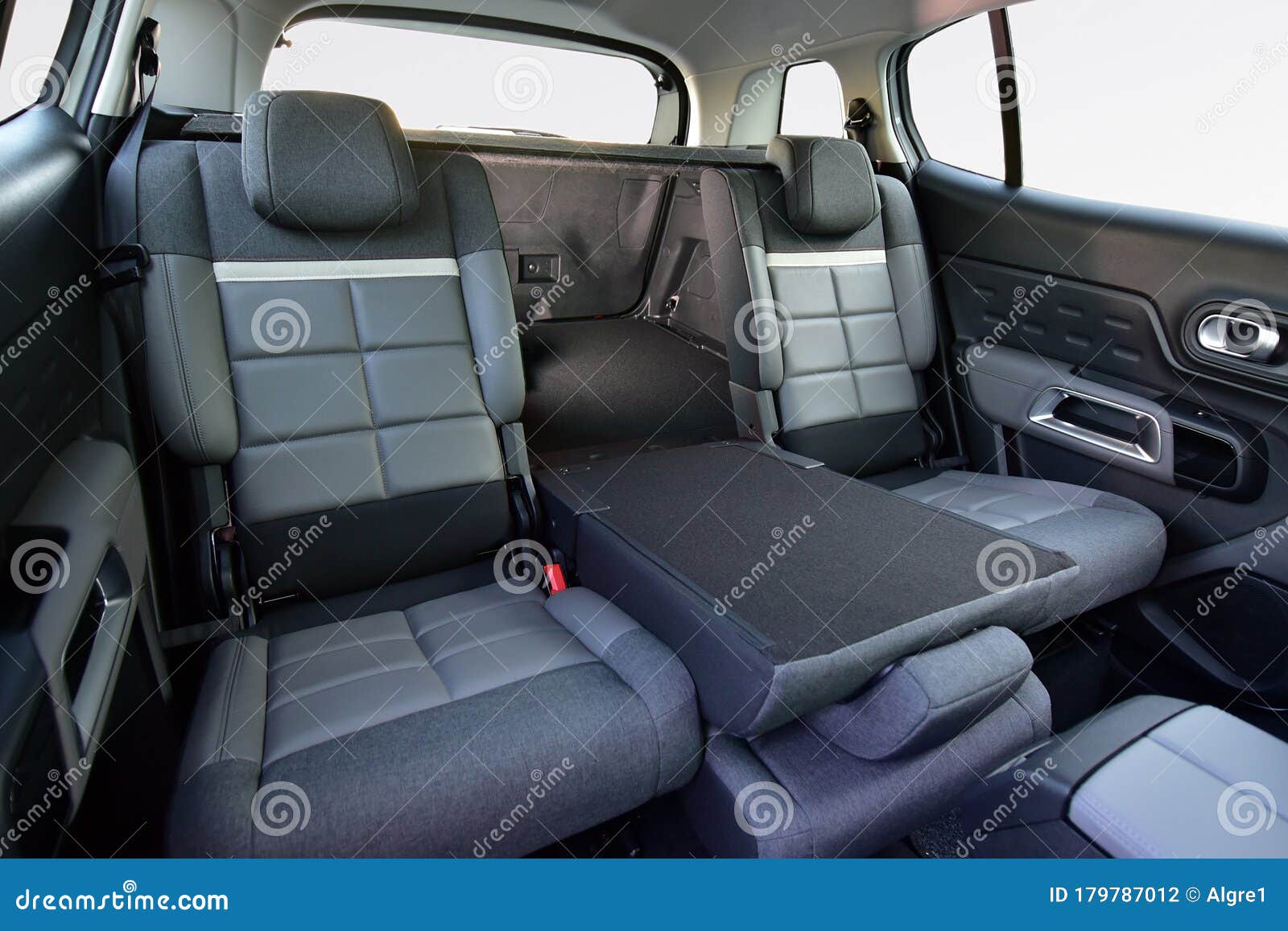 Folded Middle Seat In The Back Row Of Car Seats Stock Photo Image Of