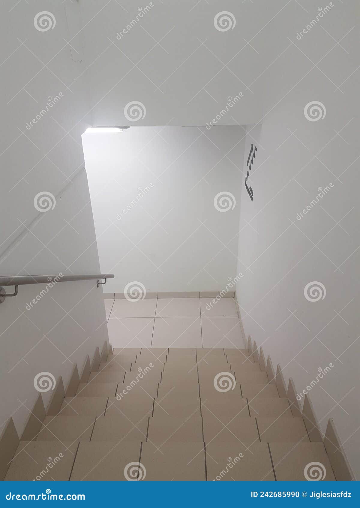 Downstairs with White Walls Stock Photo - Image of railing, walls