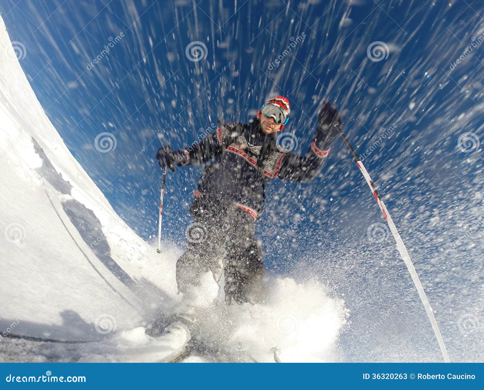 downhill alpine skiing at high speed on powder snow.