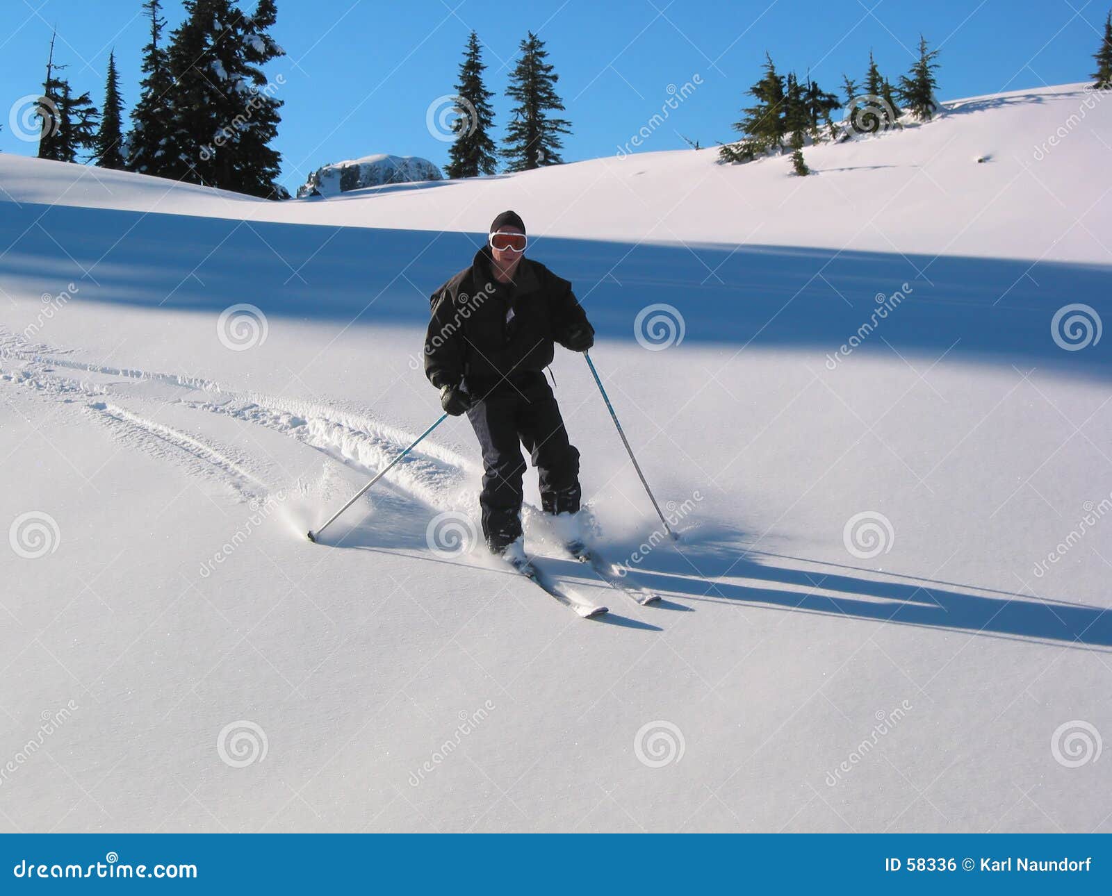 Downhill Skier stock photo. Image of rocky, rockies, snowboarding 58336